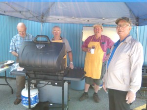 Nothing like a BBQ hotdog or hamburger on a hot summer day...thanks to Stephenville Lions members Erle Barrett, Dave Lavallee, Tony Menchenton & Dave Rex for taking control of the cooking.