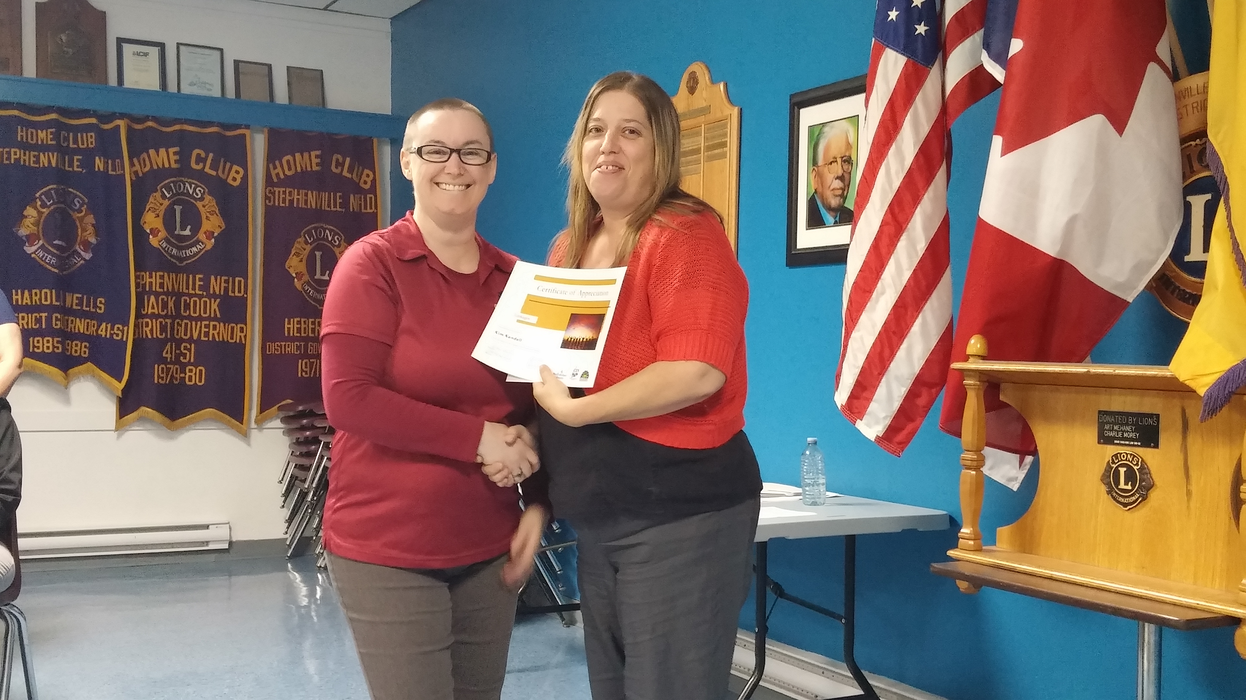 Kim Kendell, Youth Outreach Worker with Mental Health & Addictions, receiving Certificate of Appreci